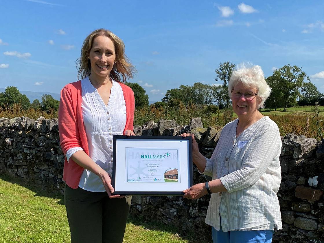 Peg Eastwood accepts Hallmark 1 and 2 awards for Thursby Parish Hall