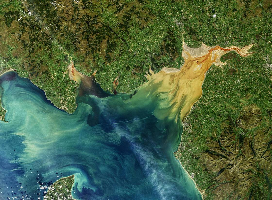 Image: sediment sloshes in Solway Firth. NASA images by Norman Kuring/NASA’s Ocean Color Web, using Landsat data from the U.S. Geological Survey. Story by Michael Carlowicz., Public domain, via Wikimedia Commons.
